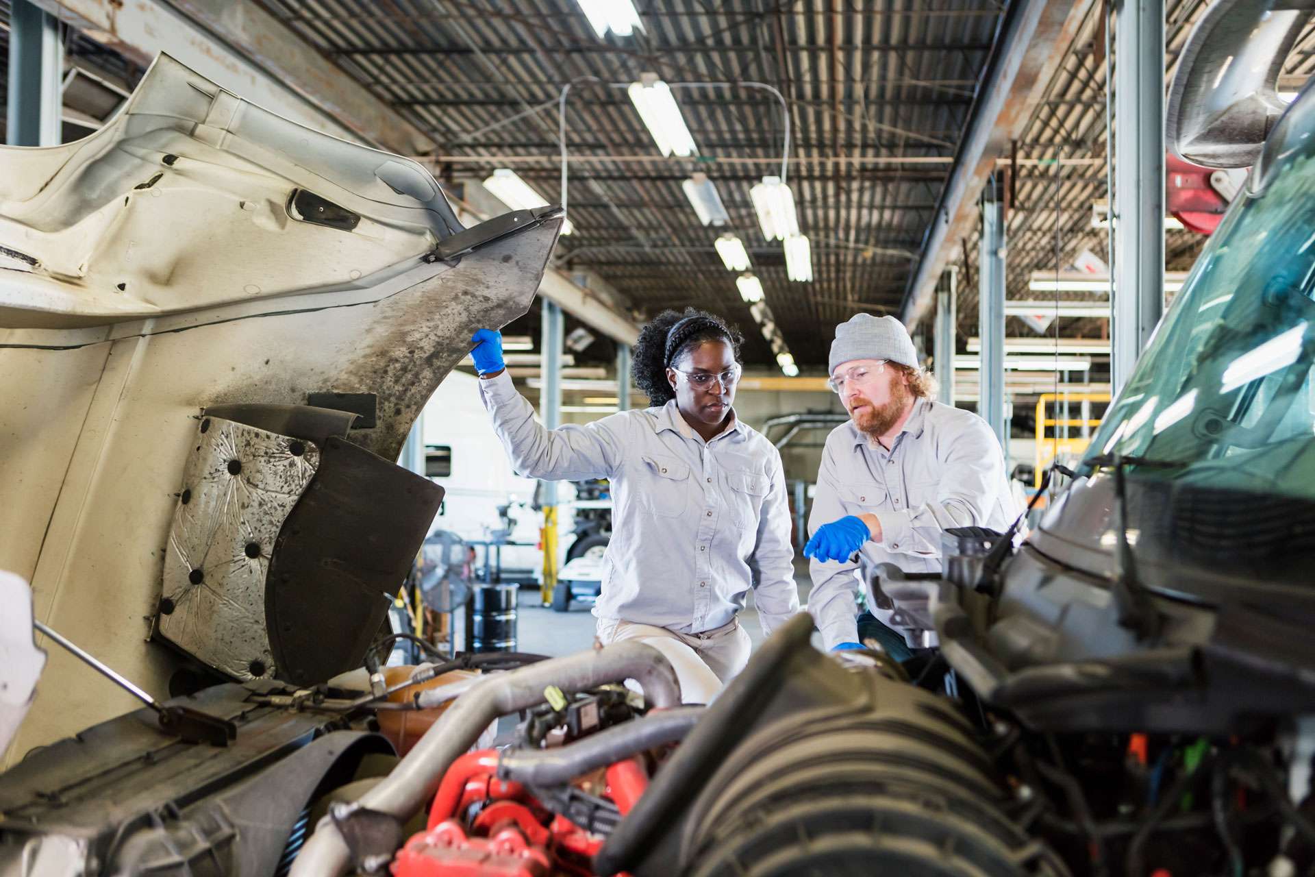 mechanics diagnosing engine